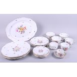 A Herend porcelain part dinner service, decorated floral sprays