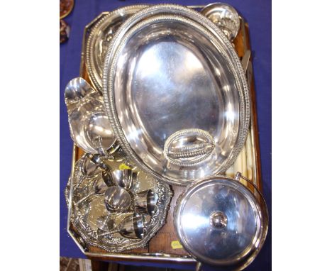 Two silver plated entree dishes, six egg cups, a biscuit barrel, a candlestick, cutlery and other items