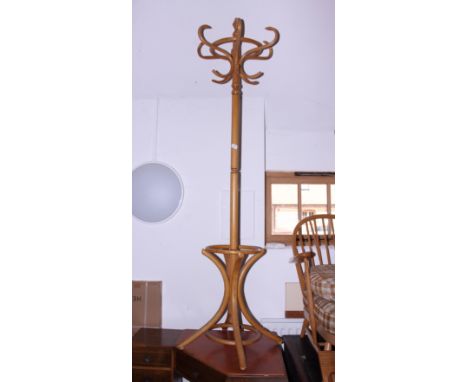 A light beech bentwood hat and coat stand and a teak book trough