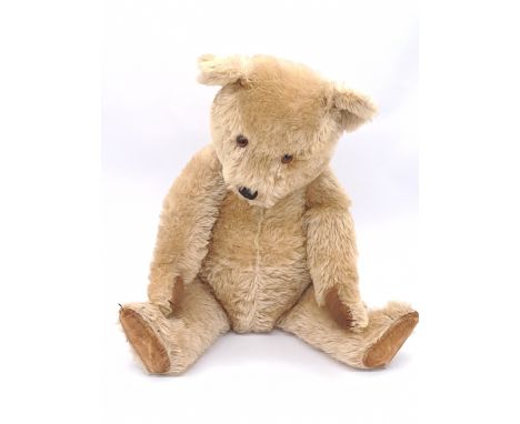 Chiltern Hug-me vintage teddy bear, British, 1950s, golden mohair with black fleck, amber and black glass eyes (right eye is 