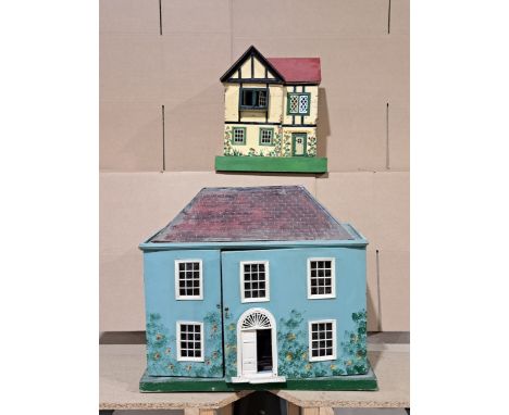 Triang and other- collection of three vintage doll's houses and a toy theatre: (1) mock Tudor house, opens at front to reveal
