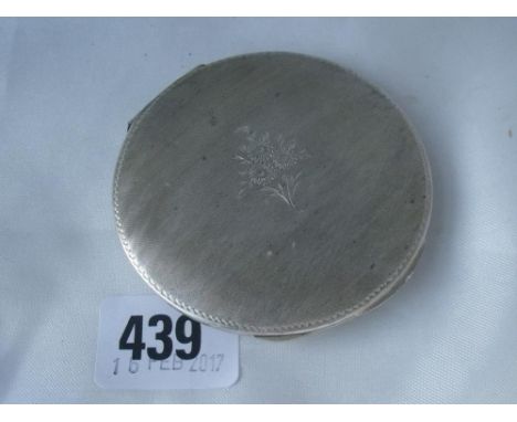 Ladies circular compact with flower motif    