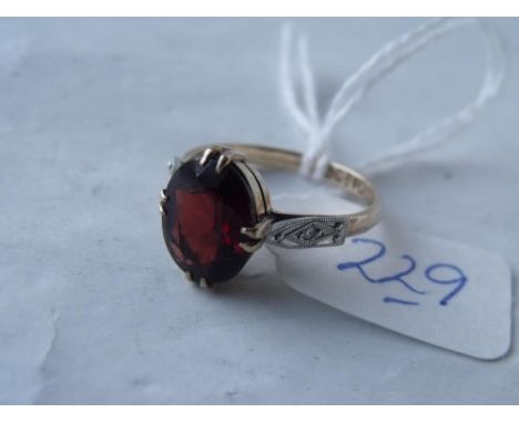 9ct garnet ring with diamond shoulders 'K'    