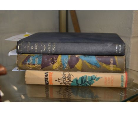 Evelyn Waugh, an edition of Tourist in Africa, First Edition 1960; together with Agatha Christie "A Caribbean Mystery" First 
