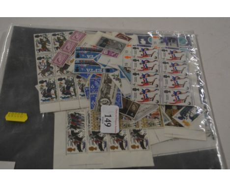 A large quantity of unmounted Queen Elizabeth II stamps, mainly pre decimal blocks including England Winners 1966 and Trafiic