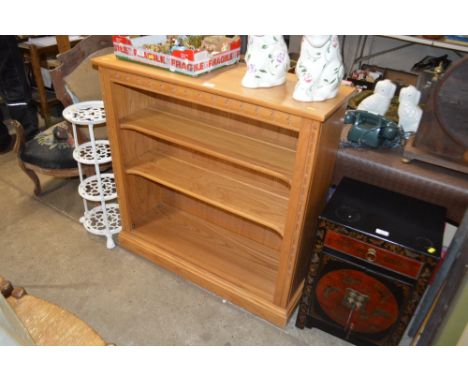 An Ercol light elm bookcase 