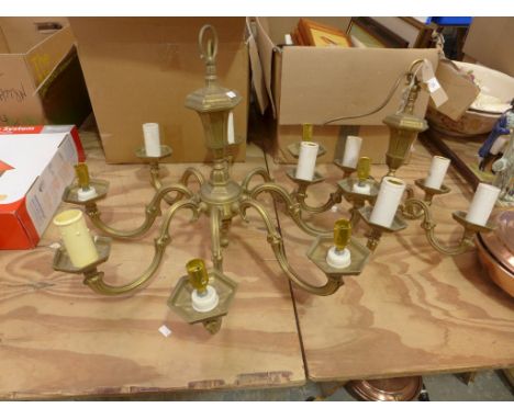 A brass eight branch ceiling light fittingAlong with a conforming five branch example. 