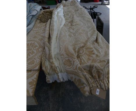 Three good quality inter lined beige pattern curtains, complete with two pelmets and ties. 