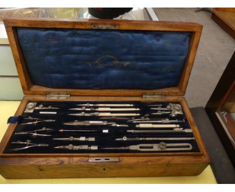An early 20th century oak cased geometry set With removable fitted tray. 