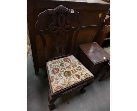 Four early 20th Century Chippendale style mahogany dining chairs. 