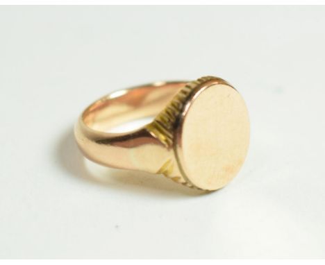 A yellow metal signet ring, finger size Q1/2.  Unmarked, gross weight 9.8 grams. 