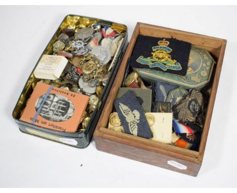 An assorted mix of militaria including buttons; badges etc; various other items including pen knife; Timex watch; postcards e