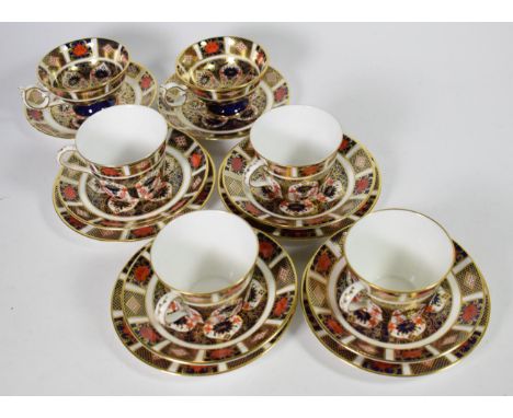 A tray of Royal Crown Derby teacups, saucers and side plates