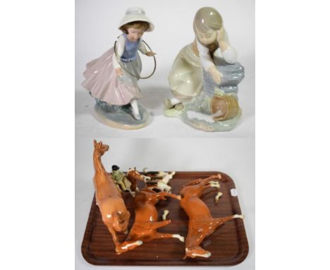 Beswick including: Mare (facing left), model no. 976, chestnut gloss; Girl on Pony, model no. 1499, skewbald gloss; another c