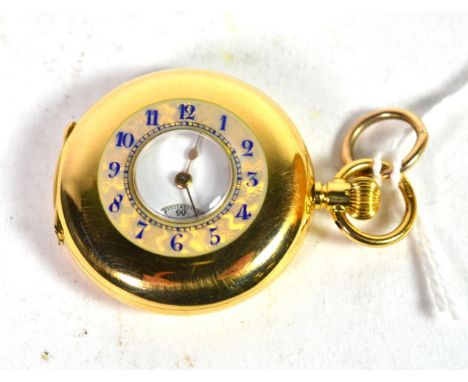 A lady's 18 carat gold half hunter fob watch, enamel decorated Arabic front cover chapter ring