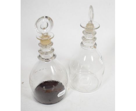 A pair of 19th century triple ring neck decanters with reeded decoration