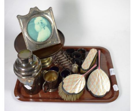 Assorted silver to include a photograph frame; an enamel part dressing table set; a toastrack etc together with a silver plat