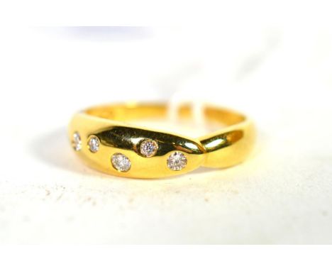 An 18 carat gold diamond set ring, finger size O.  Gross weight - 2.24 grams 