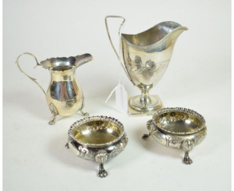 A George III silver pedestal cream jug, makers mark TL, Sheffield 1802; a pair of Victorian salts of 18th century style, Robe