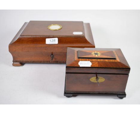 A Victorian oak box, made from wood from the Choir of York Minster; and a mahogany and inlaid tea caddy (2) 