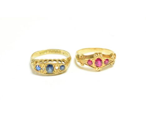 An 18 carat gold sapphire and diamond ring (one diamond missing), finger size N; and a ruby and diamond ring stamped '18ct', 