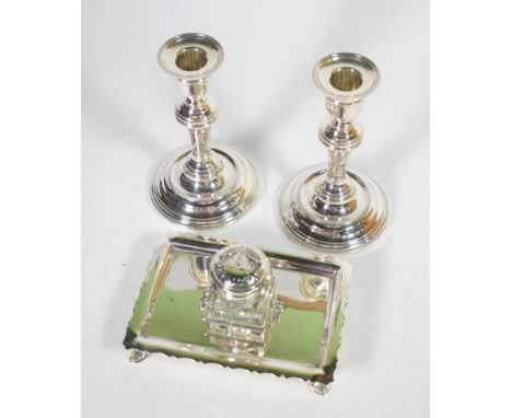 A pair of silver candlesticks, London 2000, with bead borders; and a a late Victorian silver inkstand, William Hutton &amp; S