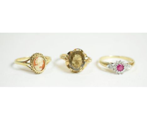 A 9 carat gold cameo ring, finger size P; a gem set dress ring stamped '9K' '375', finger size N1/2; and another 9 carat gold