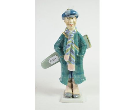 An Amphora pottery golf caddy figural pen holder, marked and stamped to base '4461', circa 1930, 26cm height