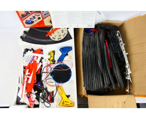 Scalextric - A C587 400 racing set containing track, controllers and Mini slot cars house in its original but damaged polysty