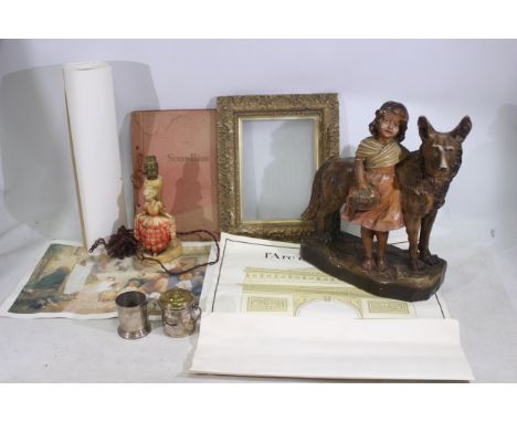 Lot consisting of a plaster figure of an Alsation dog and girl. A white metal coffee grinder with blue enamel to front, and a