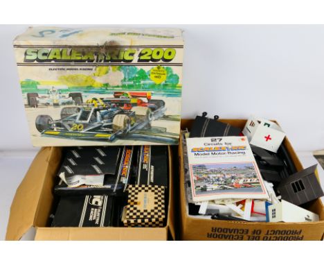 Scalextric - A boxed Scalextric 200 slot car set with a quantity of classic Scalextric track with some boxed accessories incl