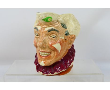 Royal Doulton - A large character jug, The Clown, white hair colourway, approximately 16 cm (h). [W]

Condition Report: Appea