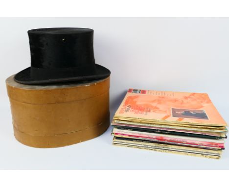 A vintage Dunne & Co top hat (internal dimensions approximately 21 cm x 17 cm) contained in hat box and a collection of 12" v