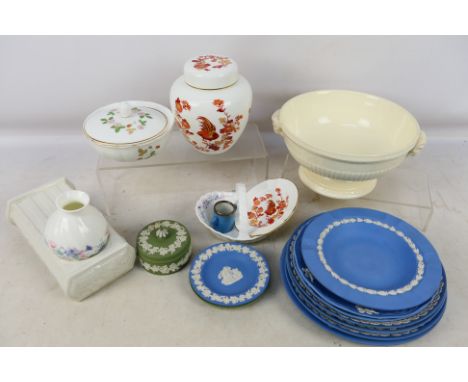 A collection of Wedgwood to include blue Jasperware Christmas plates and a miniature loving cup with silver mounted rim and b