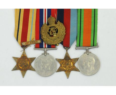 Medal group 1939-45 Star Defence Medal and 1939-45 Medal, African Star with bar for the 8th Army and Royal Engineers cap badg