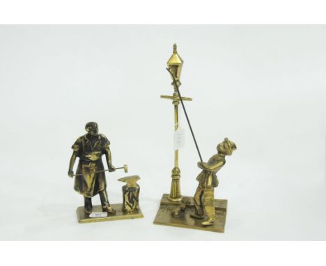 Two brass ornaments, Black Smith and a Lamp Lighter  