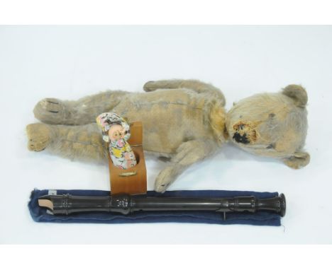 Decapitated bear, Windy Day Hats Away Jack-in-a-box and a recorder 