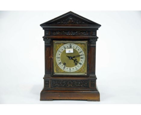 Early 20th century oak cased mantle clock with brass face, height 43 cm