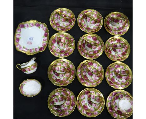 Royal Albert Crown China early 20th century floral pattern with gilt tea service comprising 12 trios, cake plate, milk jug an