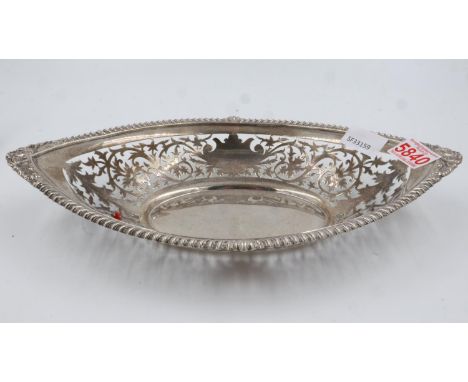 A hallmarked silver pierce-work basket, marks indistinct, 421g. UK P&amp;P Group 1 (£16+VAT for the first lot and £2+VAT for 