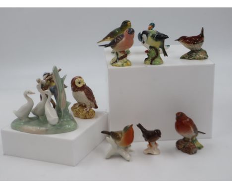 Eleven ceramic bird figures, including Beswick, Goebel and Nao examples. Not available for in-house P&amp;P