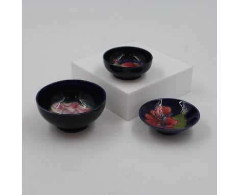 Trio of Moorcroft small footed bowls in the Hibiscus, Pomegranate and Anemone patterns, largest 11cm D. UK P&amp;P Group 2 (£