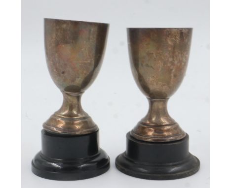 Two sterling silver trophies, with black plinths, silver combined 92g. UK P&amp;P Group 2 (£20+VAT for the first lot and £4+V