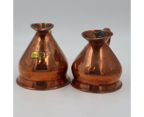 Two 18th/19th century copper measures, each H: 16 cm. UK P&amp;P Group 2 (£20+VAT for the first lot and £4+VAT for subsequent