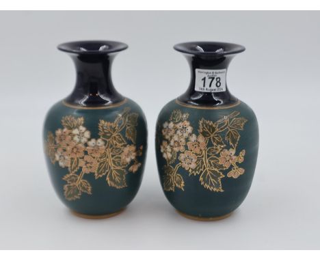 A pair of late 19th/early 20th century vases in the manner of Slaters Lambeth, each H: 20 cm. UK P&amp;P Group 3 (£30+VAT for