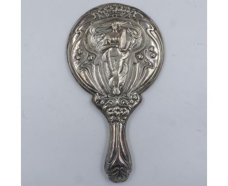 An Art Nouveau hallmarked silver hand mirror, with figural design in relief, plaster filled, marks indistinct. UK P&amp;P Gro