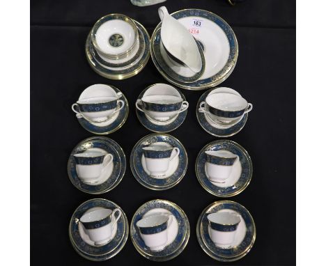 Royal Doulton tea and dinner service in the Carlyle pattern, including six trios and other examples. Not available for in-hou