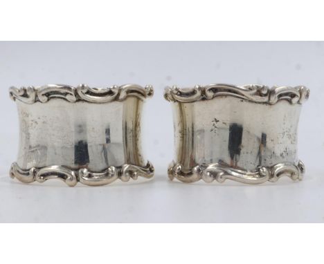 A pair of hallmarked silver napkin rings, Birmingham assay, combined 45g. UK P&amp;P Group 1 (£16+VAT for the first lot and £