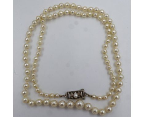 Cased vintage set of Mikimoto pearls, a graduated set, 52cm L, in original box. UK P&amp;P Group 1 (£16+VAT for the first lot