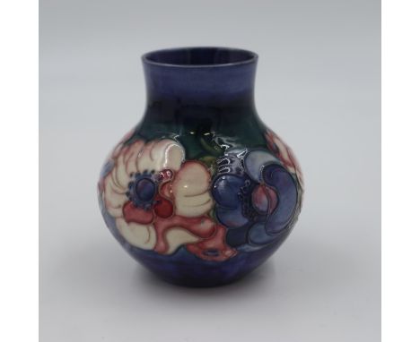 Moorcroft vase in the Anemone pattern on mottled blue ground, 12cm H. UK P&amp;P Group 2 (£20+VAT for the first lot and £4+VA